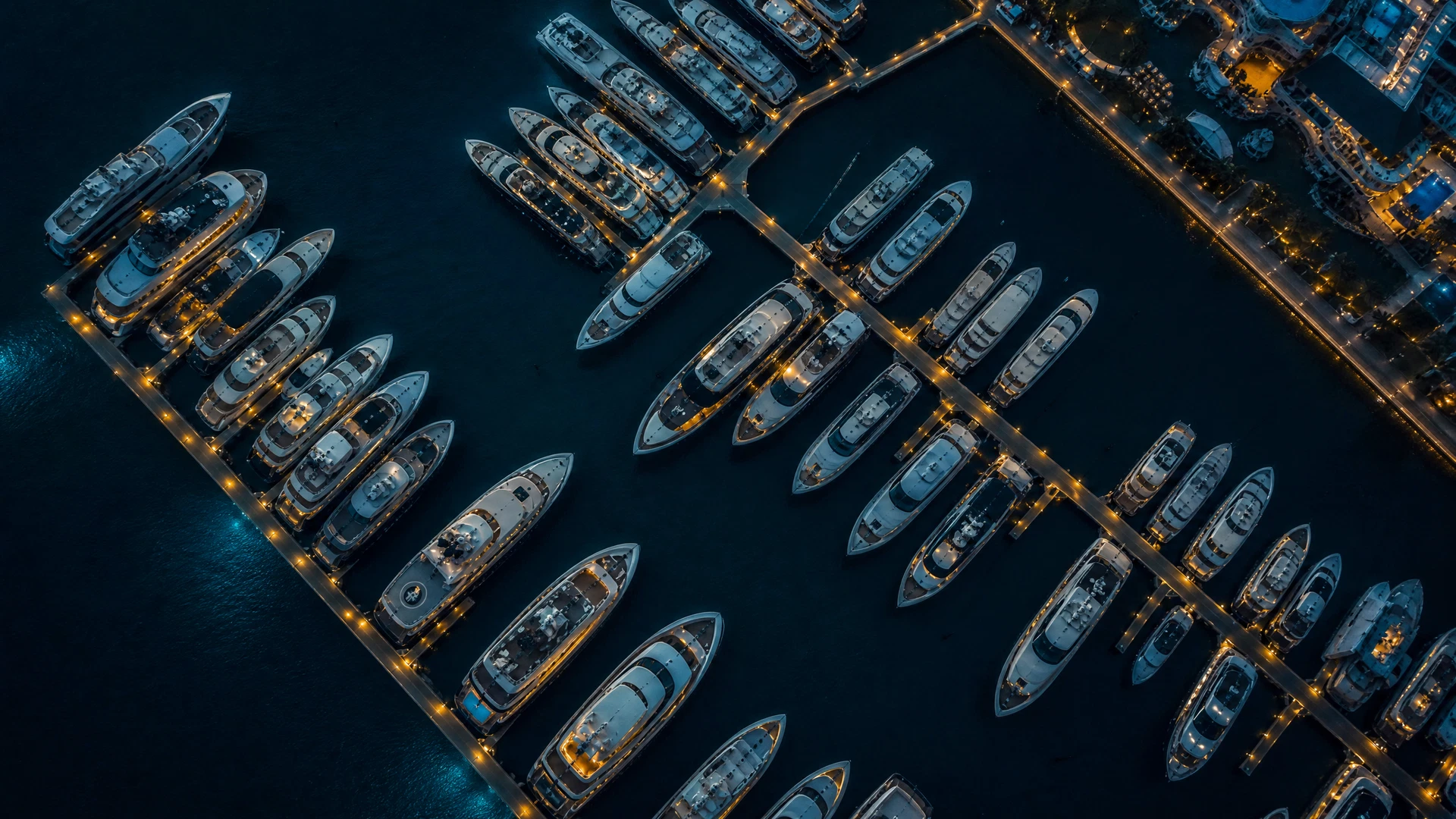 Aerial view of a luxury marina at dusk